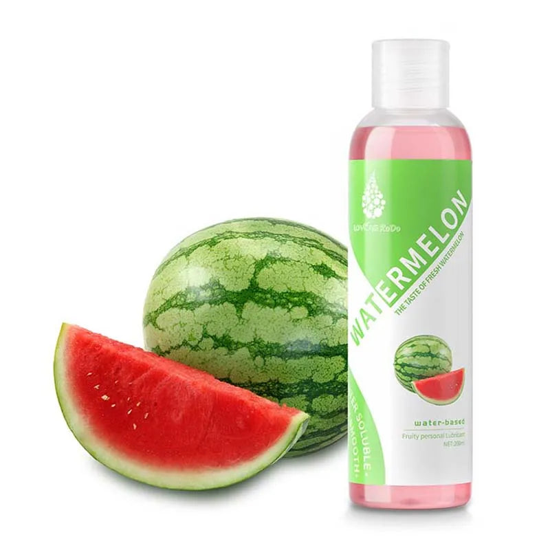 The watermelon lubricant bottle beside a slice of watermelon