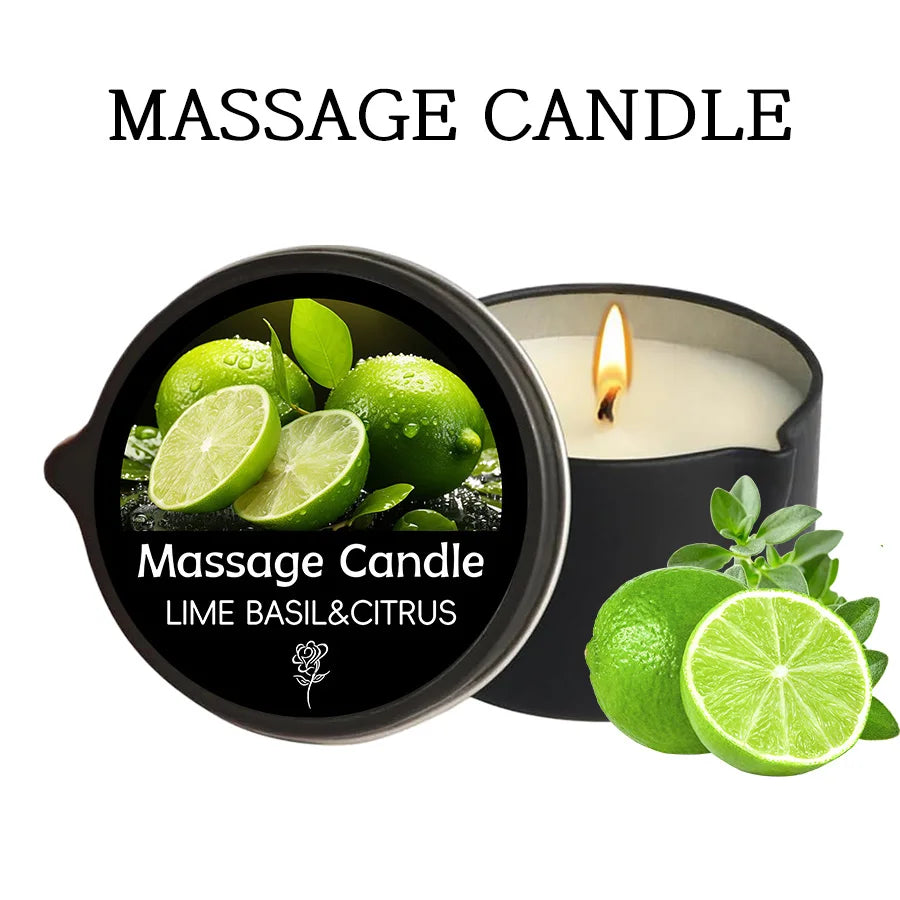 The candle in its black tin, lit, labelled lime basil and citrus, beside limes